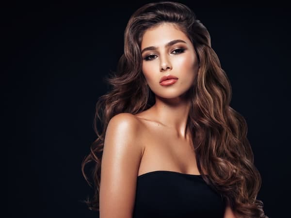 a portrait of an attractive dark-haired woman