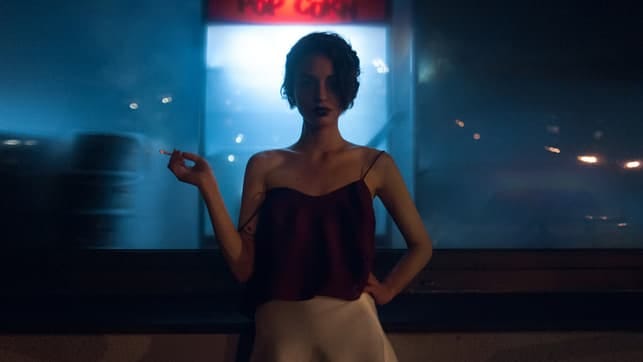 a portrait of a mysterious woman in a nightclub