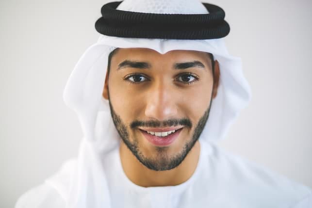 a portrait of a young Arab man