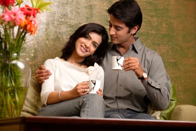 a portrait of a happy Indian couple