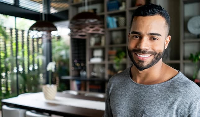 a portrait of a handsome smiling man