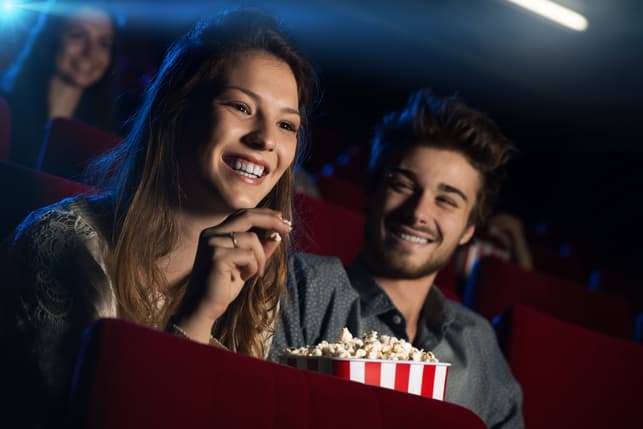 a young couple on a date at the cinema