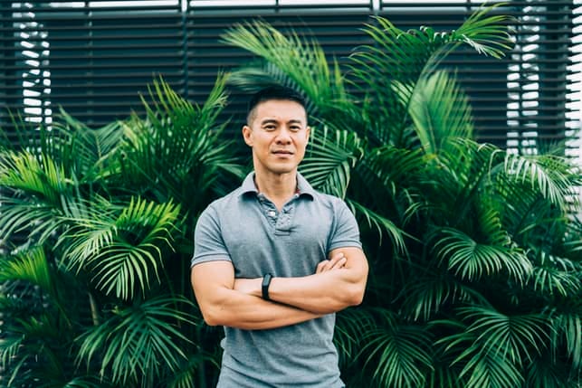 a portrait of a muscular Asian man