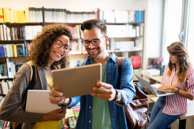 a couple using a laptop together
